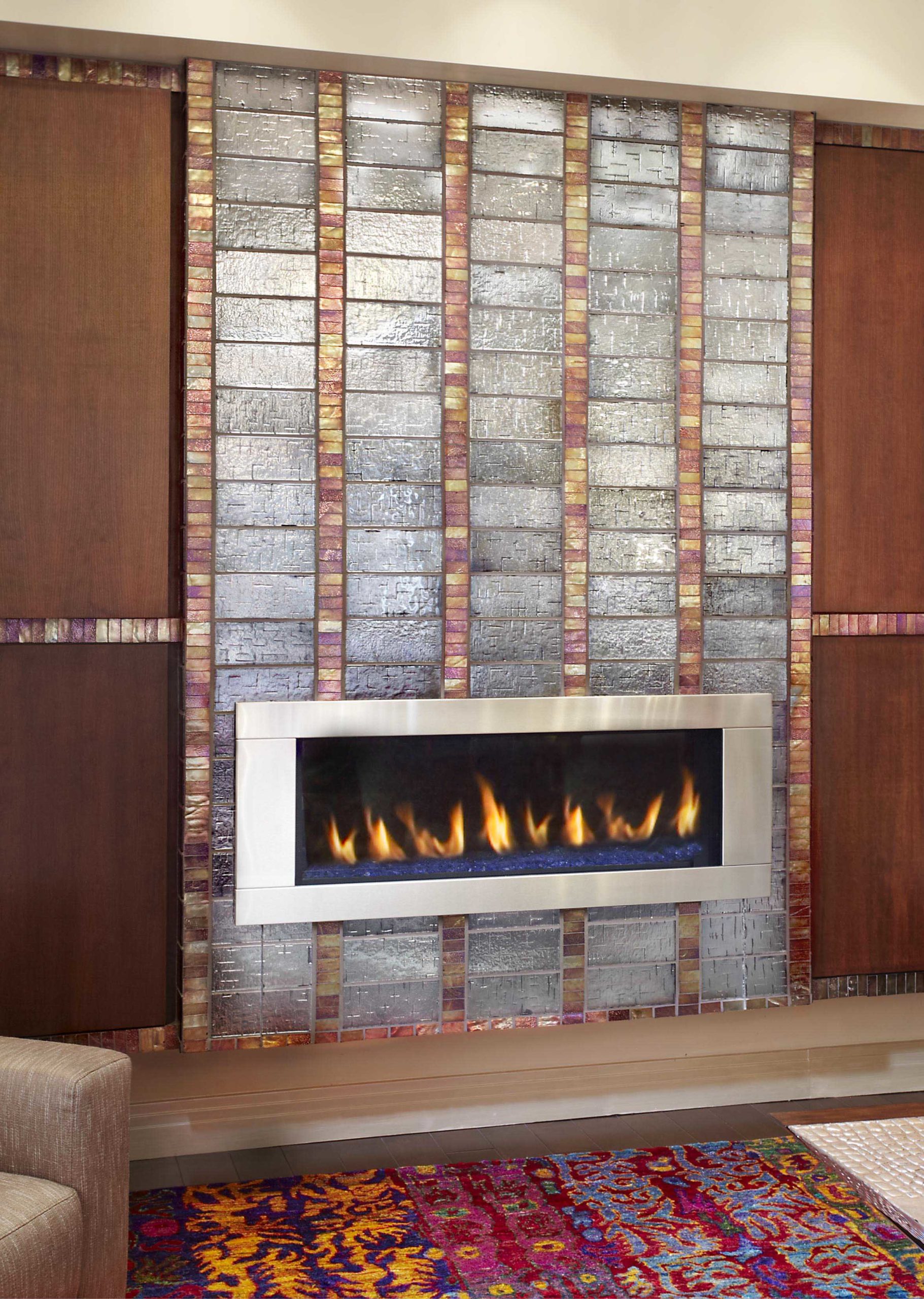 Tiled fireplace with fire lit