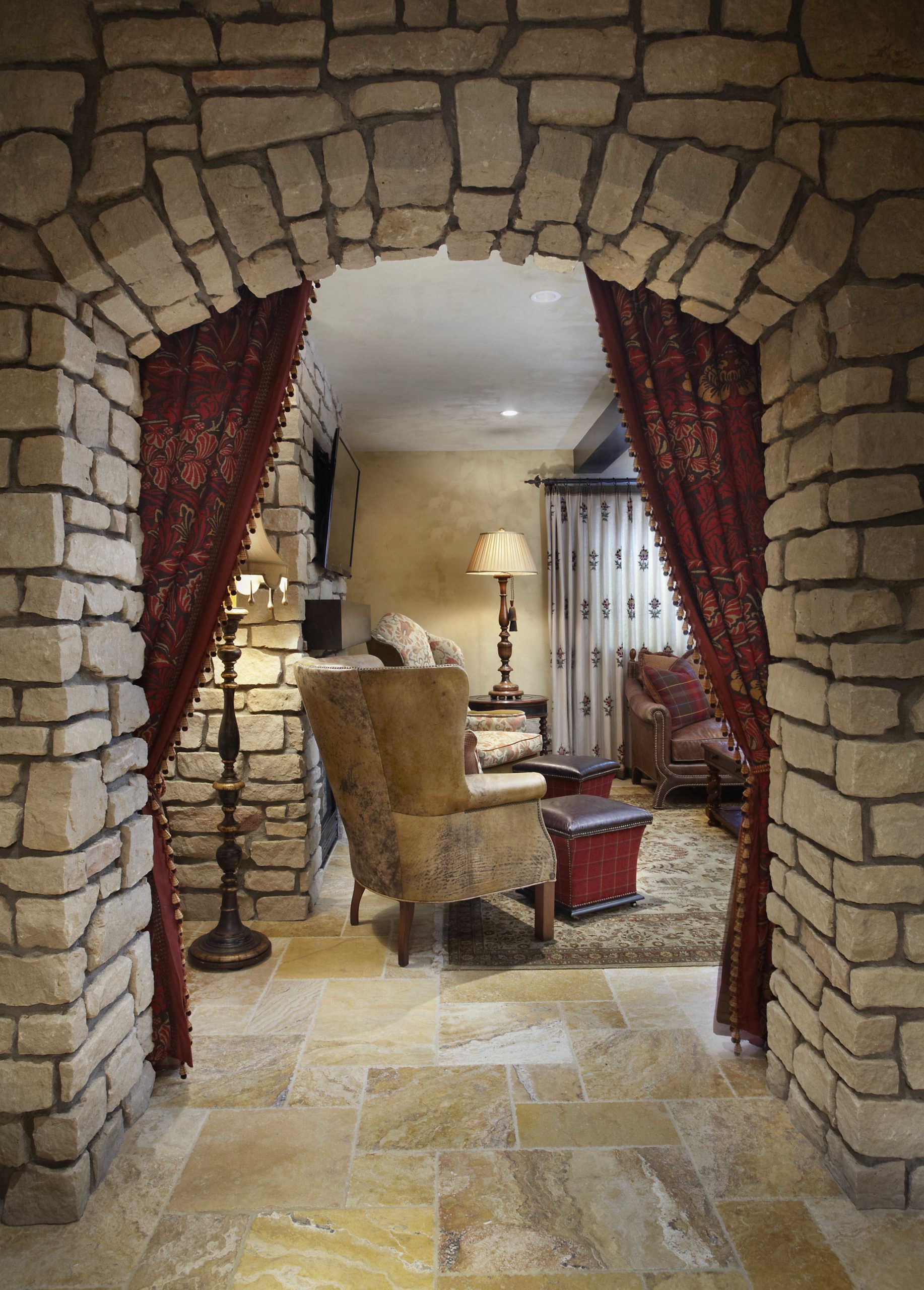 Stone arched entrance into sitting room